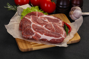 Raw pork neck steak