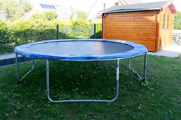 Home street trampoline on an aluminum frame, black with a blue border. Children's trampoline for...