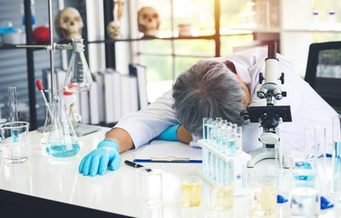 Scientist man feeling upset desperate serious stressed having problems deb