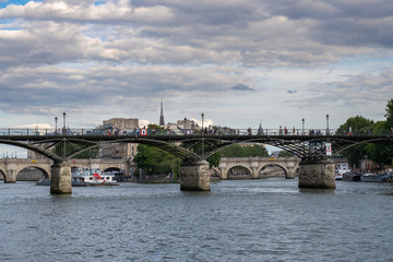 Fototapeta premium View on a bridge over the Seine and Notre Dame, France