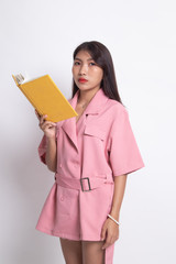 Young Asian woman with a book.