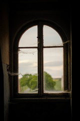 window on the wall in abandoned house