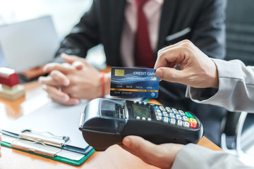 Businessman with credit cards. Payment and spending with credit cards.