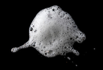 Soap foam Shaving cream bubble isolated on black background