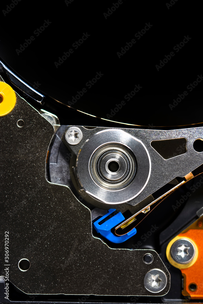 Poster disassembled hard drive from the computer, hdd with mirror effect. opened hard drive from the comput
