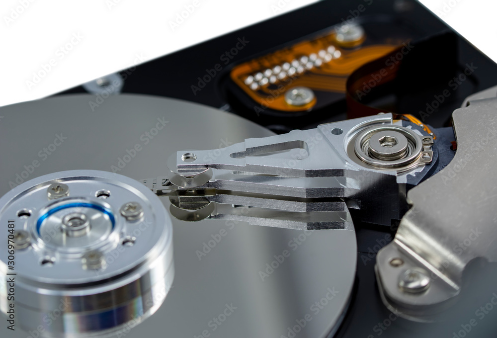 Poster disassembled hard drive from the computer, hdd with mirror effect. opened hard drive from the comput