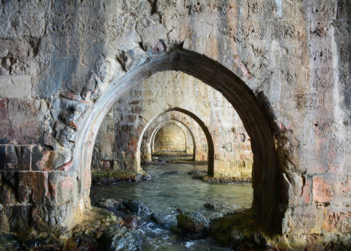 Arches inside ancient shipyard of Alanya. Turkey, Asia