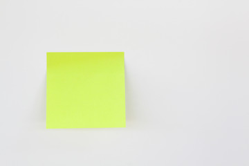 yellow sticky note with push pin isolated white background
