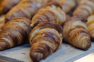 traditional fresh pastries croissants in cafe close up