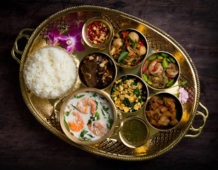 Various of Thai food on a wooden table, top view