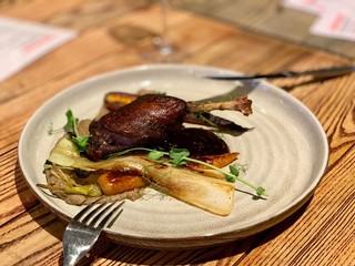 duck leg and baked vegetables