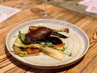 duck leg and baked vegetables