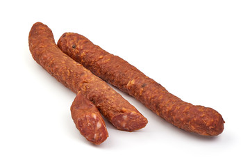 Hungarian dried sausage, spicy sausages, isolated on white background