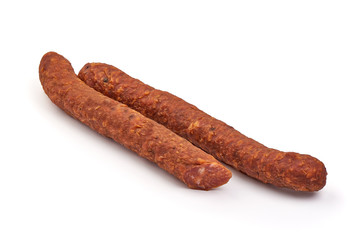 Spicy dried sausage, isolated on white background