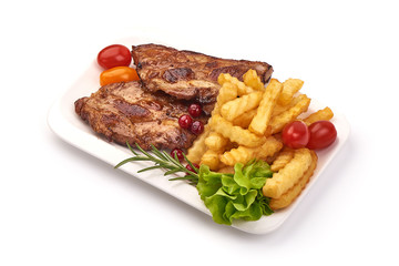 Grilled homemade pork ribs, barbecued meat with french fries, isolated on white background