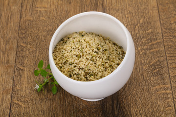 Peeled hemp seeds in the bowl