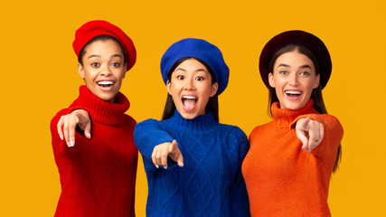 Three Multiracial Girls Pointing Fingers At Camera, Panorama, Studio Shot