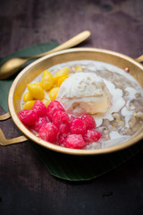 Coconut milk ice cream on brass blow with Thai Desserts,water chestnuts ,grass jelly and sweet potatoes