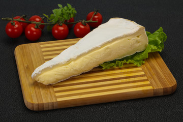 Brie cheese triangle served salad