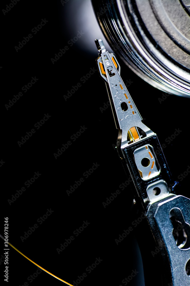 Poster disassembled hard drive from the computer, hdd with mirror effect. opened hard drive from the comput