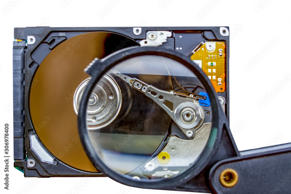 Poster disassembled hard drive from the computer, hdd with mirror effect. opened hard drive from the comput