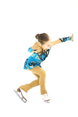 Figure skater little girl skating on ice isolated on white background.