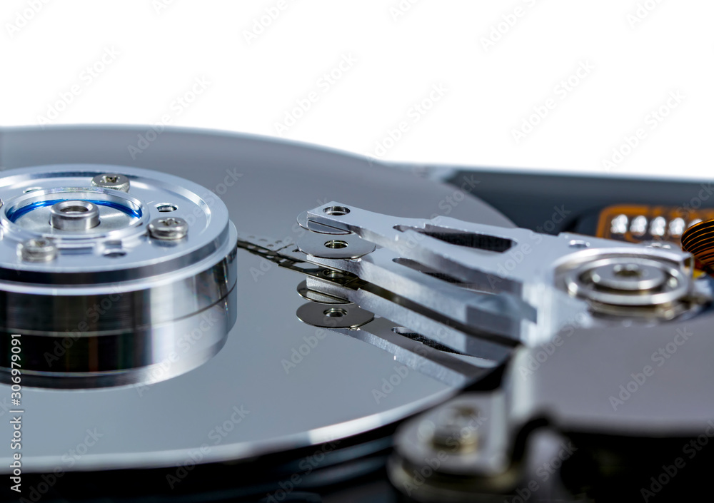 Poster disassembled hard drive from the computer, hdd with mirror effect. opened hard drive from the comput