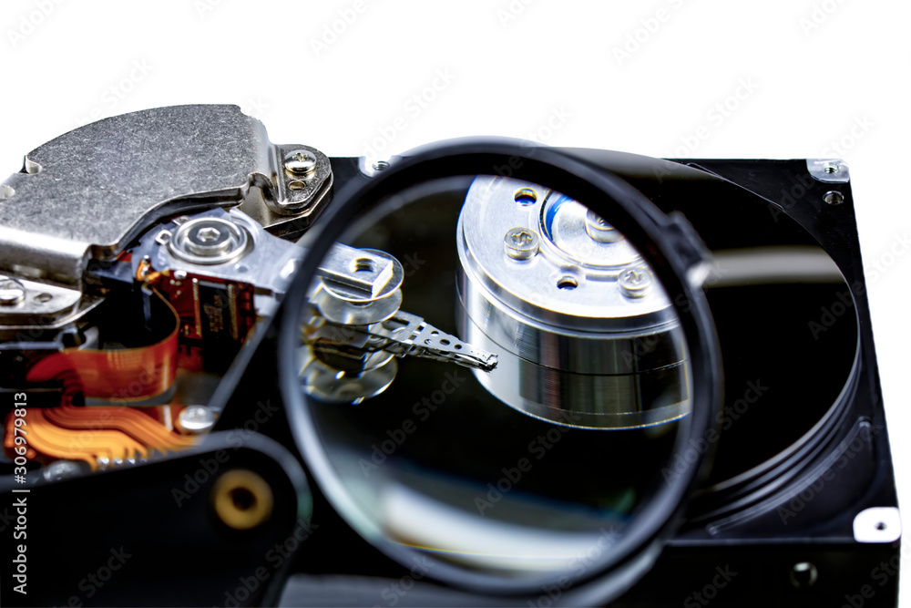 Poster disassembled hard drive from the computer, hdd with mirror effect. opened hard drive from the comput