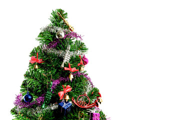 Green Christmas tree decorated with gifts And white background