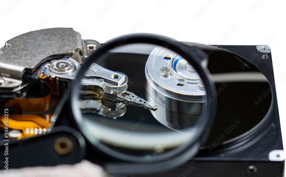Poster disassembled hard drive from the computer, hdd with mirror effect. opened hard drive from the comput