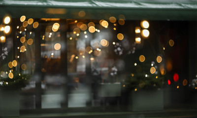 Christmas blurry lights on the street and Christmas tree