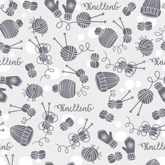 Vector seamless pattern with hats, mittens, balls of yarn and knitting needles. Background on the theme of hobby and knitting