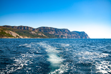 Fototapeta premium The trace of the motor in the sea water. Wake of a ferry boat