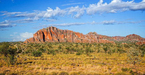 Dome of rocks at a hiking trip at the Australian outback between with blue sky at the morning light...