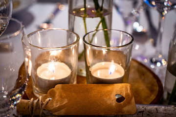 candles and name card on a table