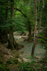 Fototapeta na wymiar Kanchanaburi Jungle Waterfalls and Pristine Phuket Beaches