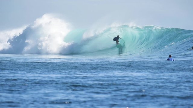 Footage of a surfer in a barrel in Lombok, Indonesia. Shot in 4k.