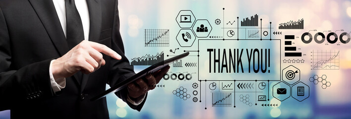 Thank you message with businessman using his tablet computer