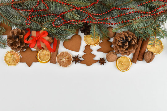 The concept of zero waste. New Year. Postcard, tree, garland, cones, vanilla, lemon, star anise. Place for an inscription.
