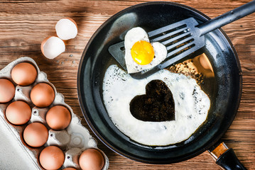 Fried fresh egg on pan. Egg on pan with yolk. Fried eggs