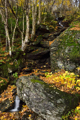 Waterfall from Madonna peak Sterling Range from Smugglers Notch road Vermont in Fall