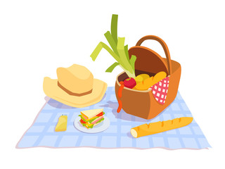 A picnic basket with vegetables, straw hat, French baguette, a plate with a sandwich on a checkered tablecloth.