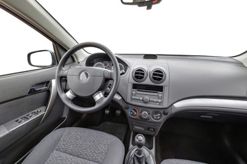 panorama in interior leather salon of prestige modern car. steering wheel, shift lever and dashboard