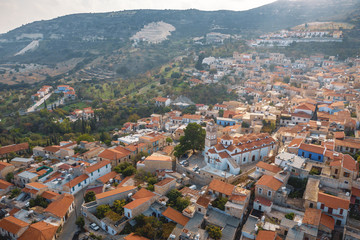 Fototapeta na wymiar Aerial view of Pano Lefkara village in Larnaca district, Cyprus. Famous old village in mountains with orange roofs.