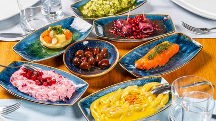Turkish and Greek Traditional Dinning Table with Special Alcohol Drink Raki. Ouzo and Turkish Raki is a dry anise flavoured aperitif that is widely consumed in Turkey, Greece, Cyprus and Lebanon