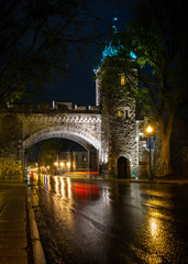 Quebec City Wall, the main gate to Old Quebec in the rainy night 