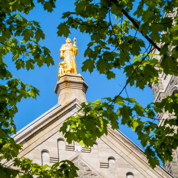 Statue of Saint Roch and his dog at the Saint-Roch Church in Quebec City, Quebec, Canada 