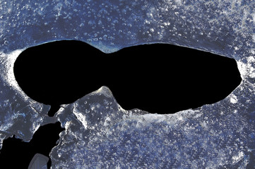 melting ice on black background, sunglasses, sweden, sverige, nacka, stockholm, europe