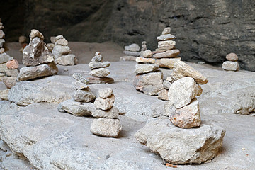 japanese cairns in a cave