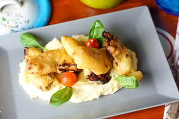 Chicken dish on a restaurant table